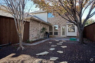 Building Photo - 4 Bedroom 3 bath home with a great floor p...