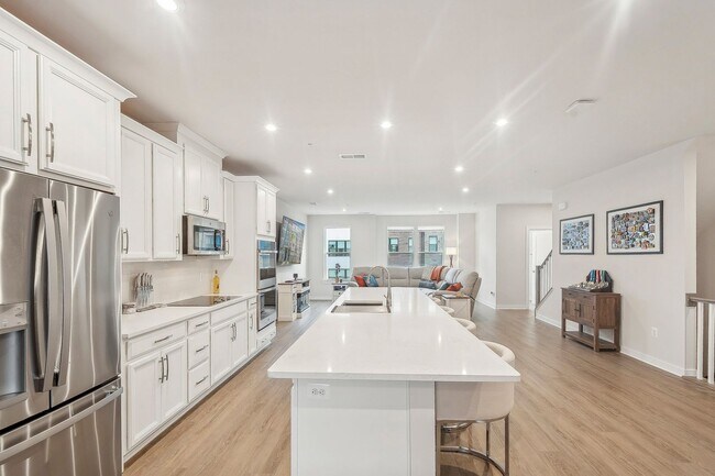 Building Photo - The Julianne is modern, functional, and full of charm—don’t let it get away!