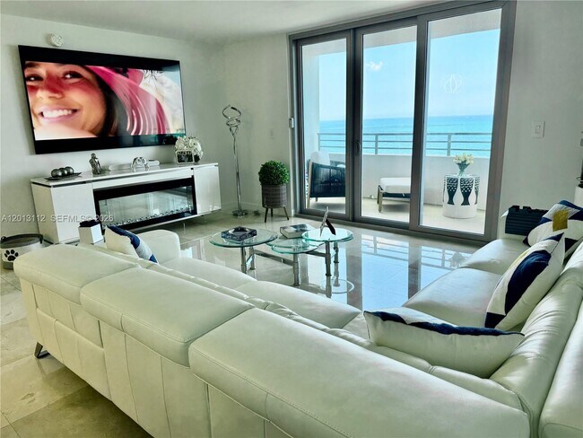 Building Photo - 5555 Collins Ave