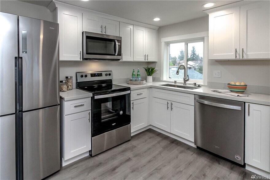 Quartz counters, new cabinets and lighting - 1519 S 46th St