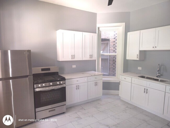 Building Photo - 1661 S Homan Ave