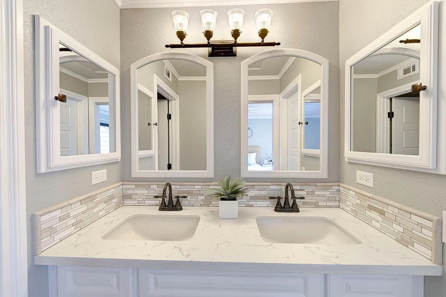 DUAL vanity with quartz counters and tile backsplash - 14 Coventry Ln