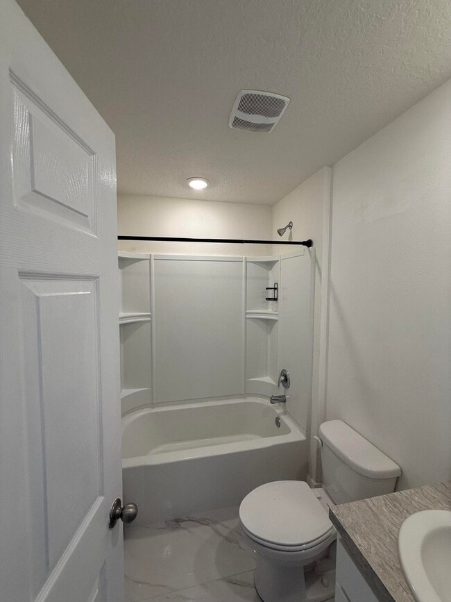 Building Photo - 1205 SW Alcantarra Blvd