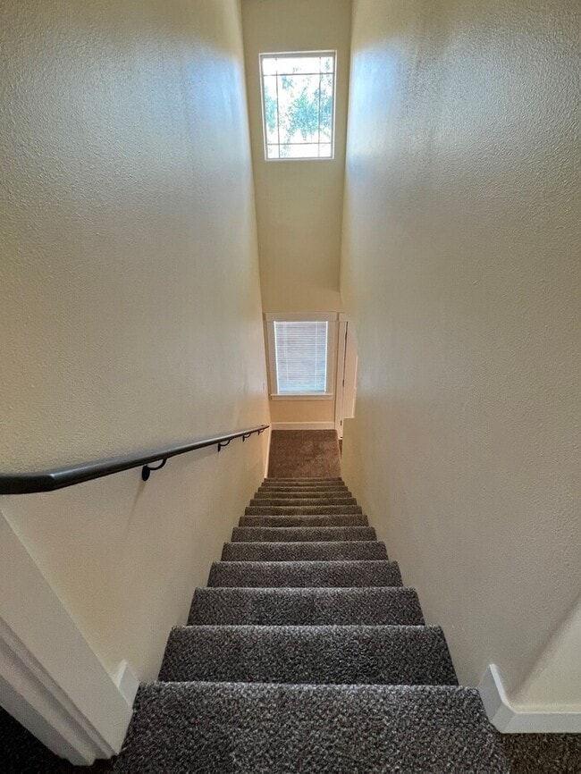 Building Photo - Remodeled Home with New Flooring, Quart Counters, W/D, Fenced Yard, Parking & MORE!