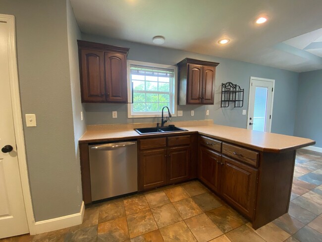 Building Photo - Your Dream Rental Awaits in Osage Hills – ...