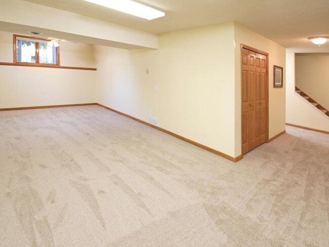 Building Photo - Elegant 2-Story has 4 BRs on Upper Level, Office, 2 Family Rooms, Fireplace & More!