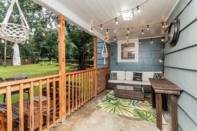 Building Photo - Back porch with a large yard!