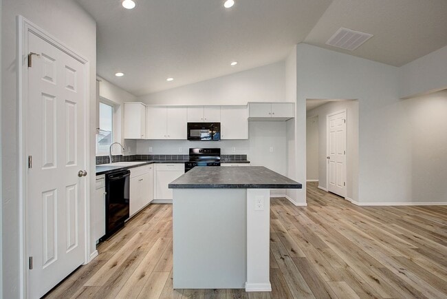 Building Photo - The 3 bedroom, 2 bedroom home also has a f...