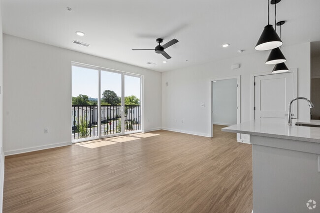 2BR, 2BA - 1,032SF - Living Room - West Row Lofts & Townhomes