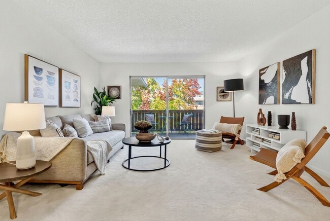 Building Photo - Modern 2-Bedroom Condo with Pool and Koi Pond Views