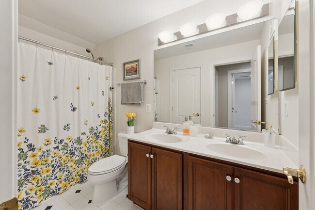 Building Photo - Discover this stunning four-level townhous...