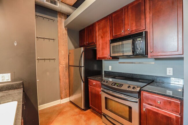 Building Photo - Live in Style at Old Manchester Lofts!