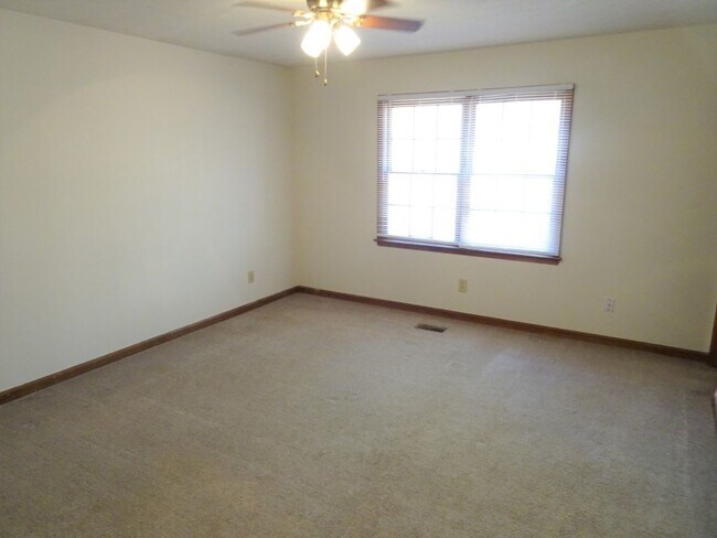 Building Photo - Great location, large wooded and fenced ya...