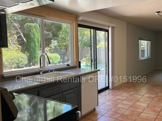 Building Photo - **Spacious 4-Bedroom Home with Pool in Desirable Rincon Valley**