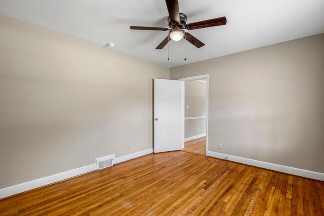 Building Photo - Large Renovated Ranch Home, Two Kitchens & Two Living Areas, Hardwood Flooring, Deck, Fenced!