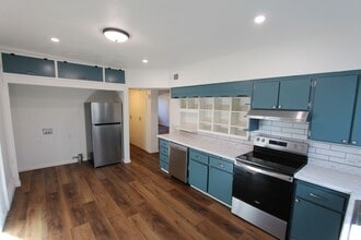 Building Photo - $500 Move-In Special! Remodeled Unit with Community Garden