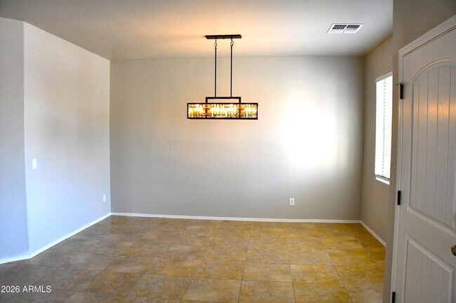 Building Photo - 8787 W Gardenia Ave