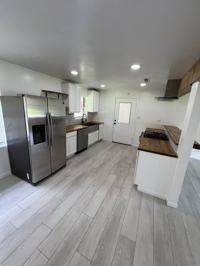 Building Photo - Updated 3BR | Solar Panels + Fenced Yard