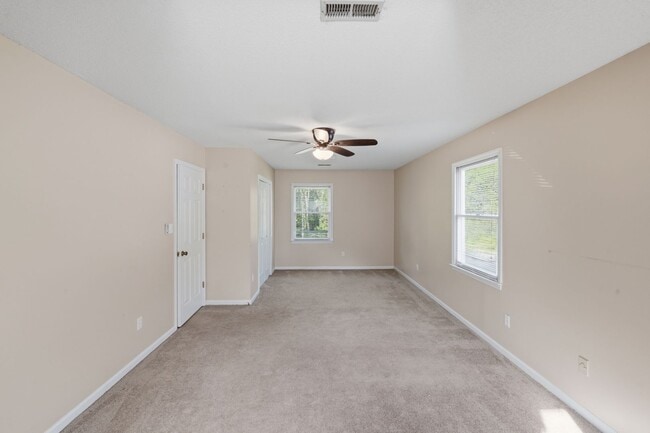 Building Photo - Spacious 4BR with Beautiful Backyard Retreat!