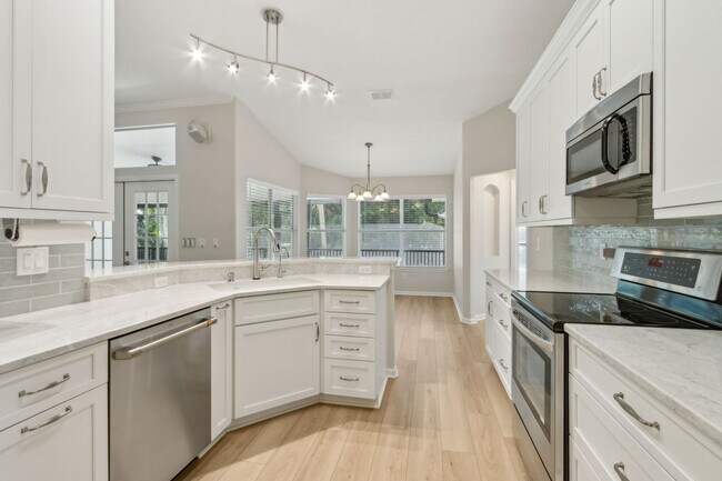Building Photo - Coastal Luxury Meets Modern Efficiency – 4...