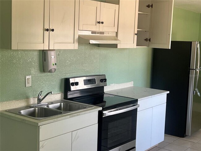 Building Photo - 2002 E 33rd Ave