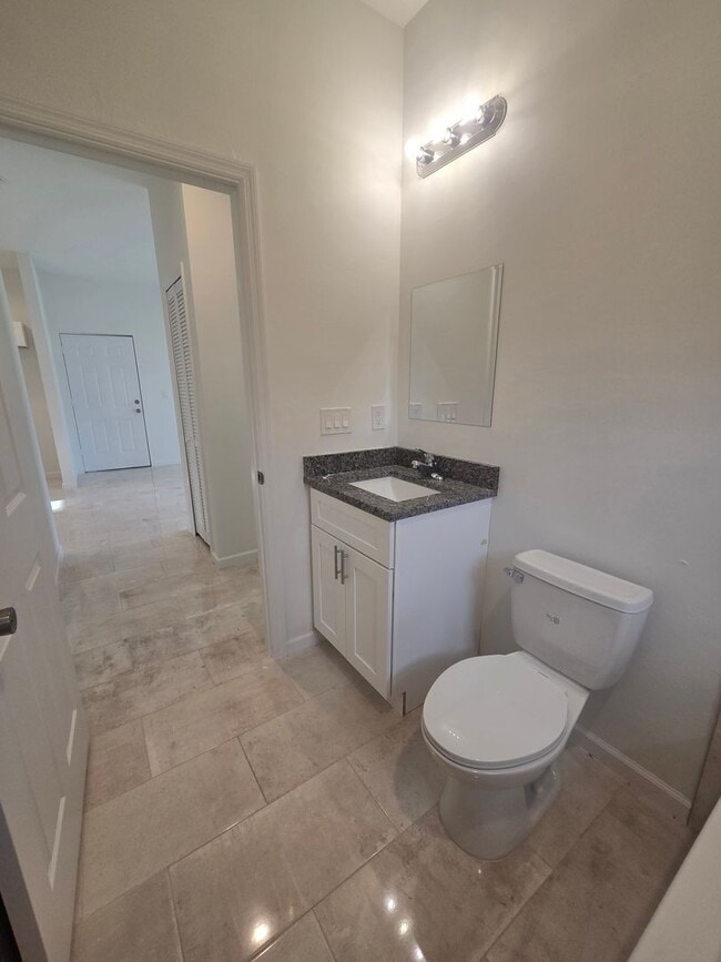 Building Photo - Brand New 2/2/1- SW Lehigh Acres