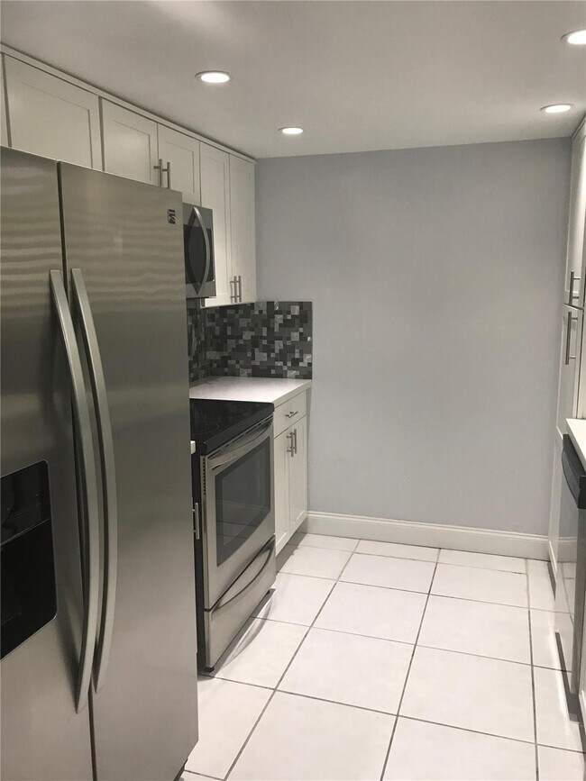 Building Photo - 9576 SW 1st Ct