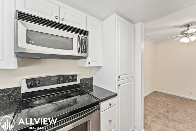 Building Photo - Stunning Dual Master Condo Available NOW i...