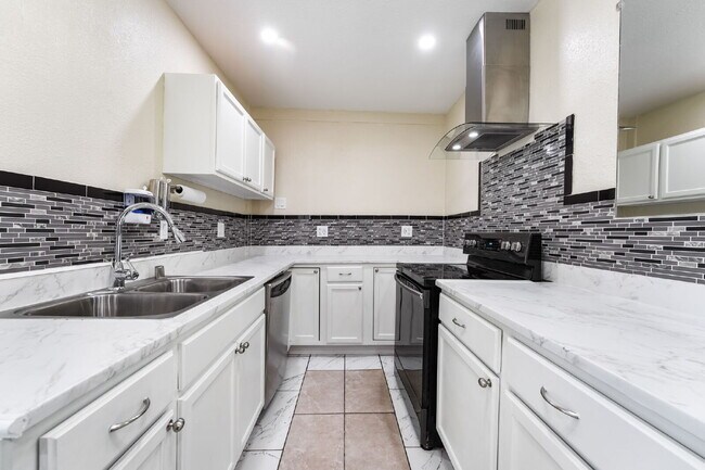 Building Photo - Single Story,  Totally Renovated , 3 bedroom, 2 bathroom Home with  extensive privacy and gated h...