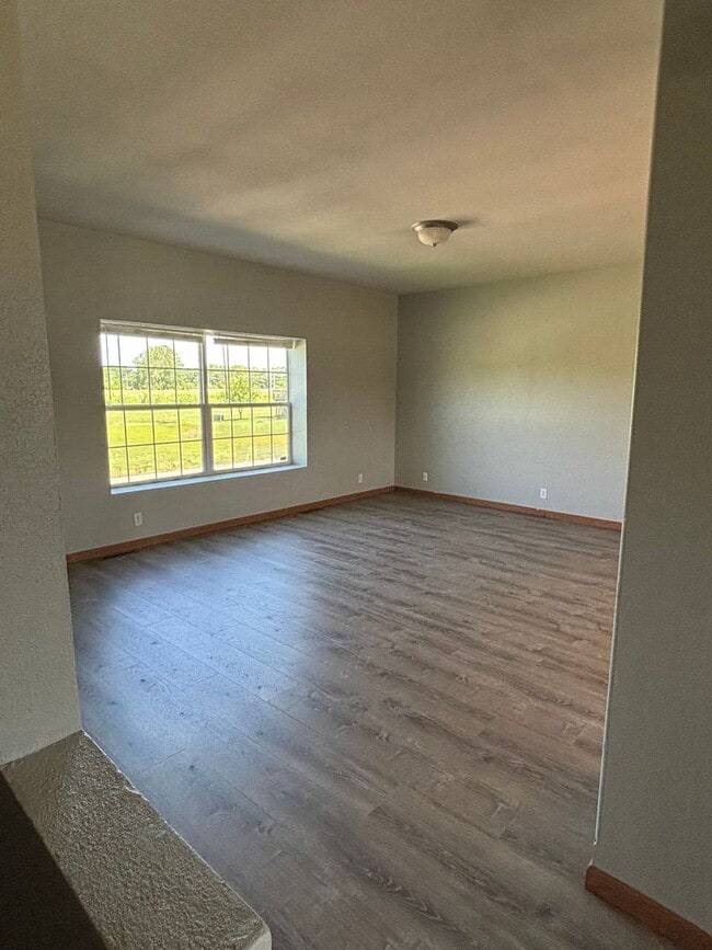 Building Photo - Fully Remodeled 3 Bedroom-HUGE 4th Bonus Room| 2.5 Bath Townhome – Great Location off K-18!