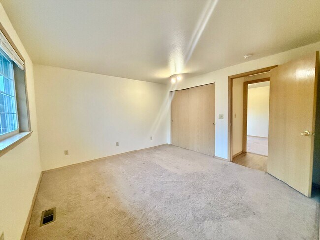 Building Photo - Sunny Rambler on Corner Lot with Large Fenced Yard & Deck