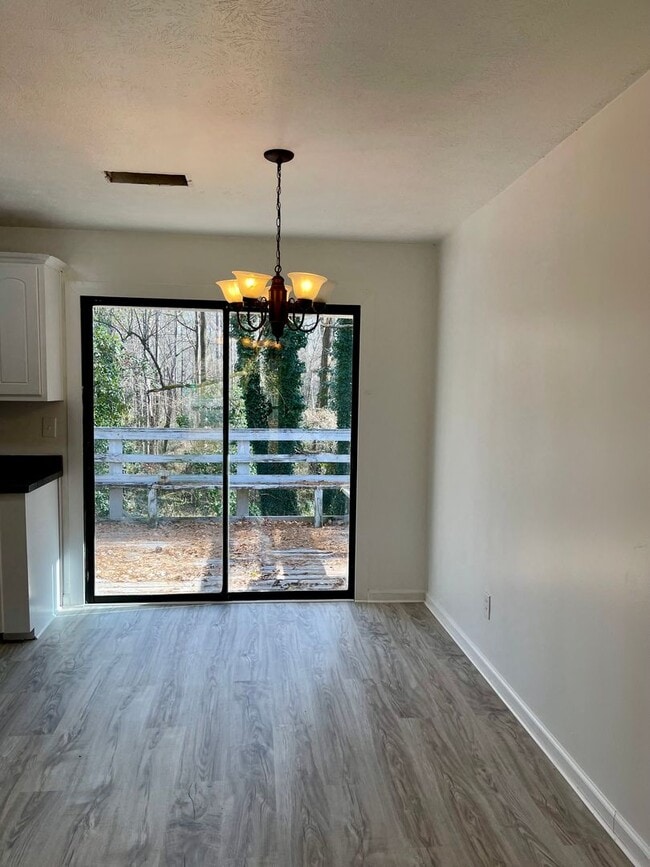 Building Photo - Updated 4 Bedroom Home with NO Carpet!