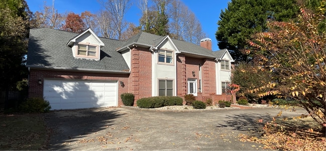 Building Photo - Stately Brick Home in Prime City Location