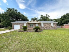 Building Photo - Completely Updated Brick Home with New Kitchen Appliances, Bathrooms, Flooring & Paint!