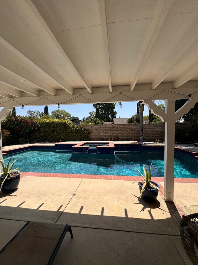 Building Photo - BEAUTIFULLY Updated Home with Pool+ Modern...