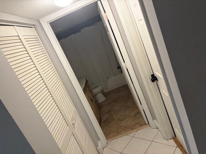 Pantry for snacks and hallway for bathroom and bedroom - 9521 Boca Cove Cir