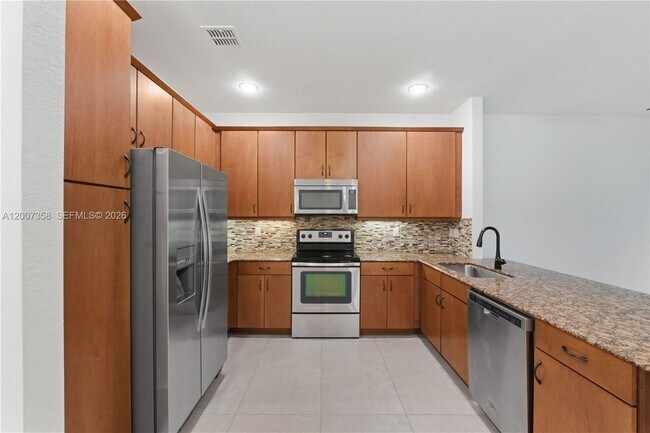 Building Photo - 13012 Riverwalk Cir N