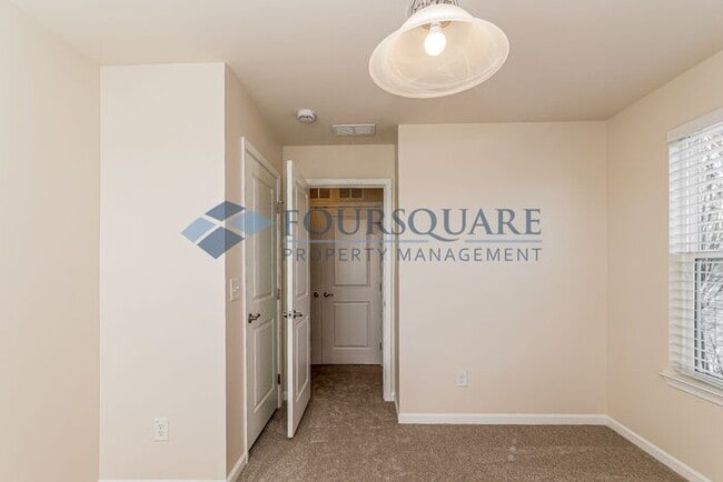 Building Photo - Spacious 3-Bed End Unit Townhome with 2-Car Garage & Private Patio | Prime Kitts Creek Location