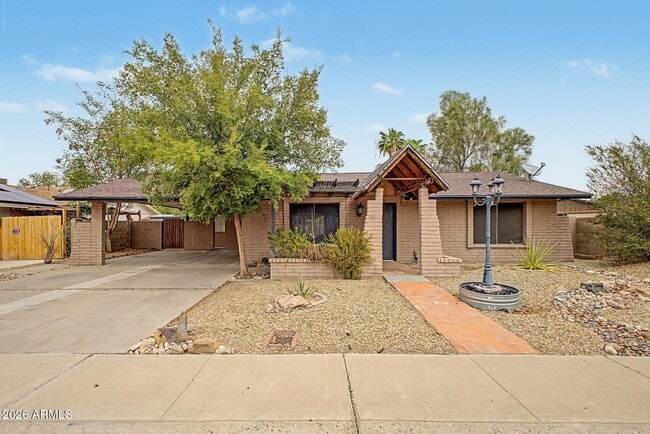 Building Photo - 6616 W Aire Libre Ave