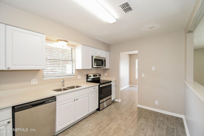 Building Photo - 7850 Blank Dr N