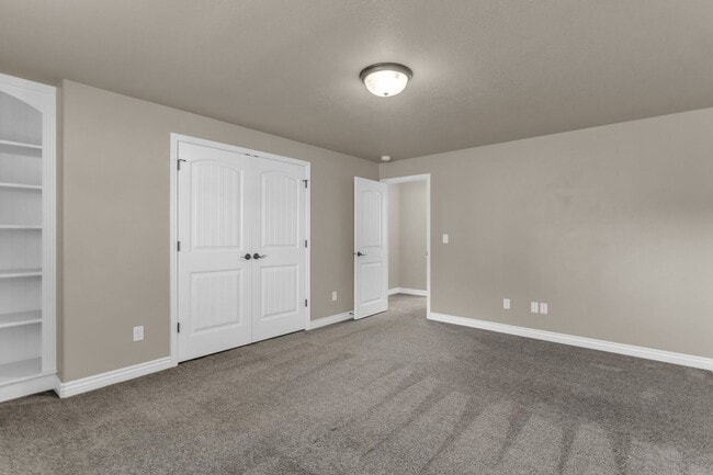 Building Photo - Spacious Syracuse Home with Covered Deck, Loft & Oversized 3-Car Garage