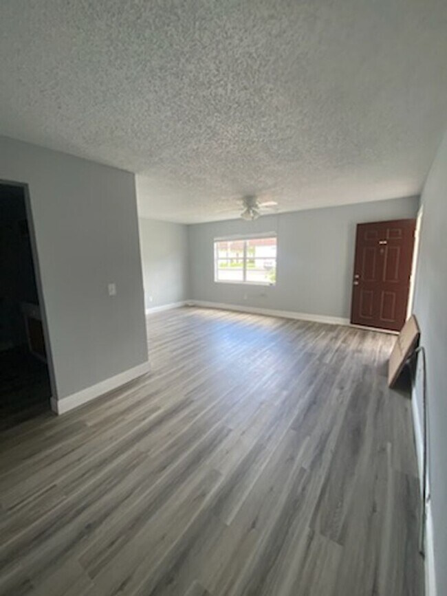 Building Photo - Beautiful water view ground floor condo in...