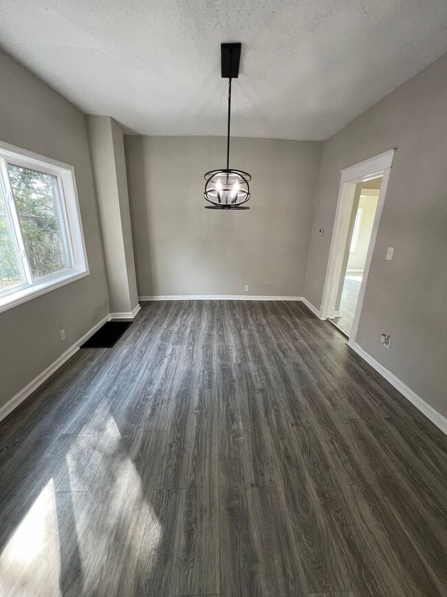 Building Photo - Updated 4-Bedroom Home with Plenty of Living and Storage Space.