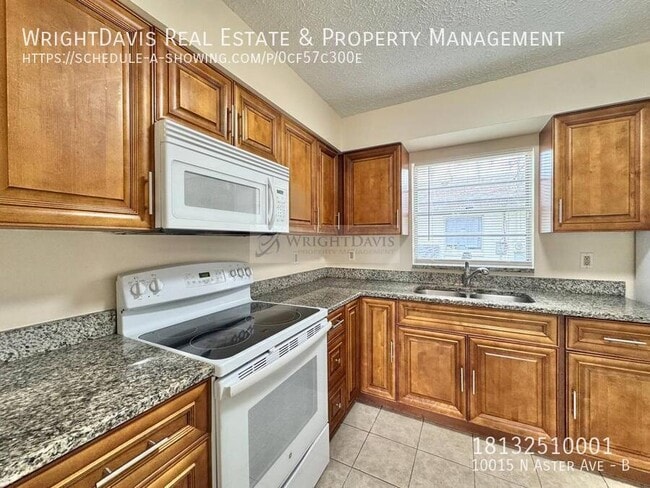 Building Photo - 10015 N Aster Ave