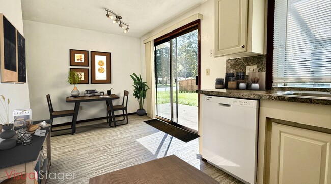 Building Photo - Two Bedroom Townhome with AC, Garage & Ful...