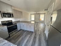 Building Photo - Three bedroom three bath available now!