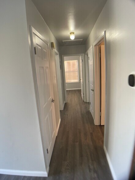 Hallway to 3 bedrooms and the bathroom. - 1442 Parnell Ave