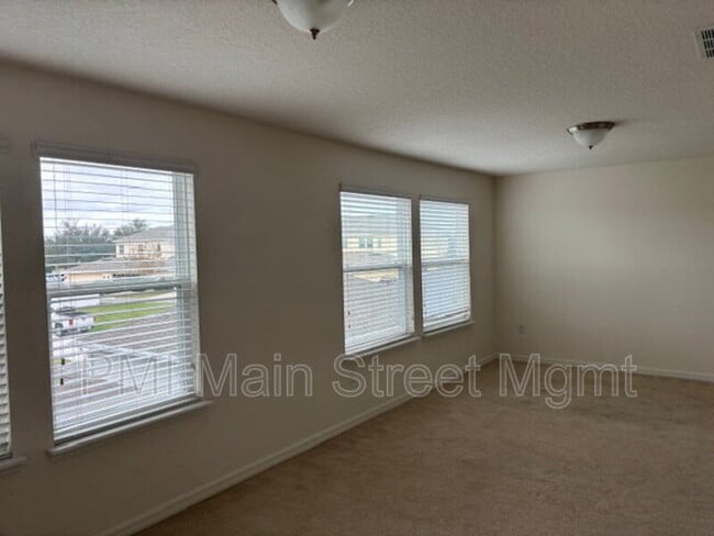 Building Photo - 8130 Red Stopper Ln