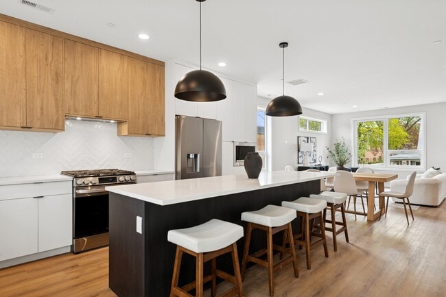 Building Photo - Forest Park - New Construction Luxury Townhomes!