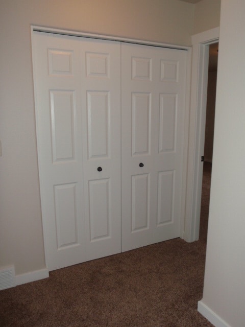 Building Photo - Newer house with attached garage. Half mon...